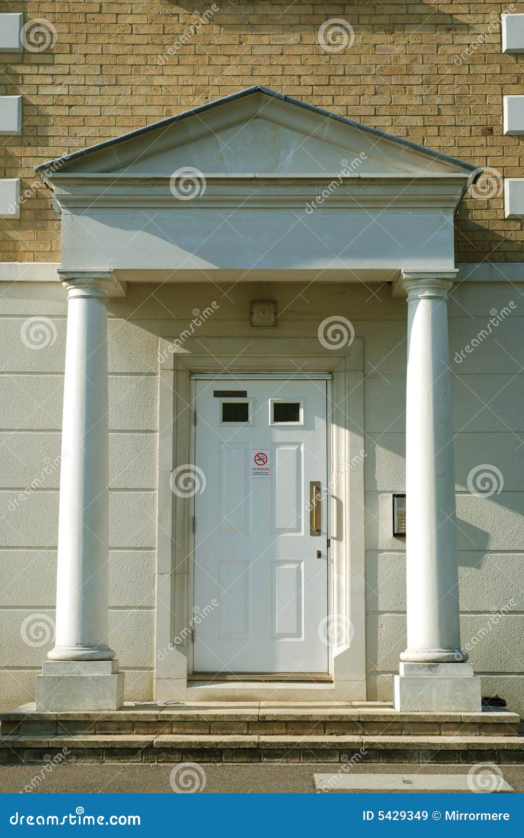 Front Door A House Or Apartment With Welcome Mat And White Wooden Bannister  Stock Photo, Picture and Royalty Free Image. Image 137676465.