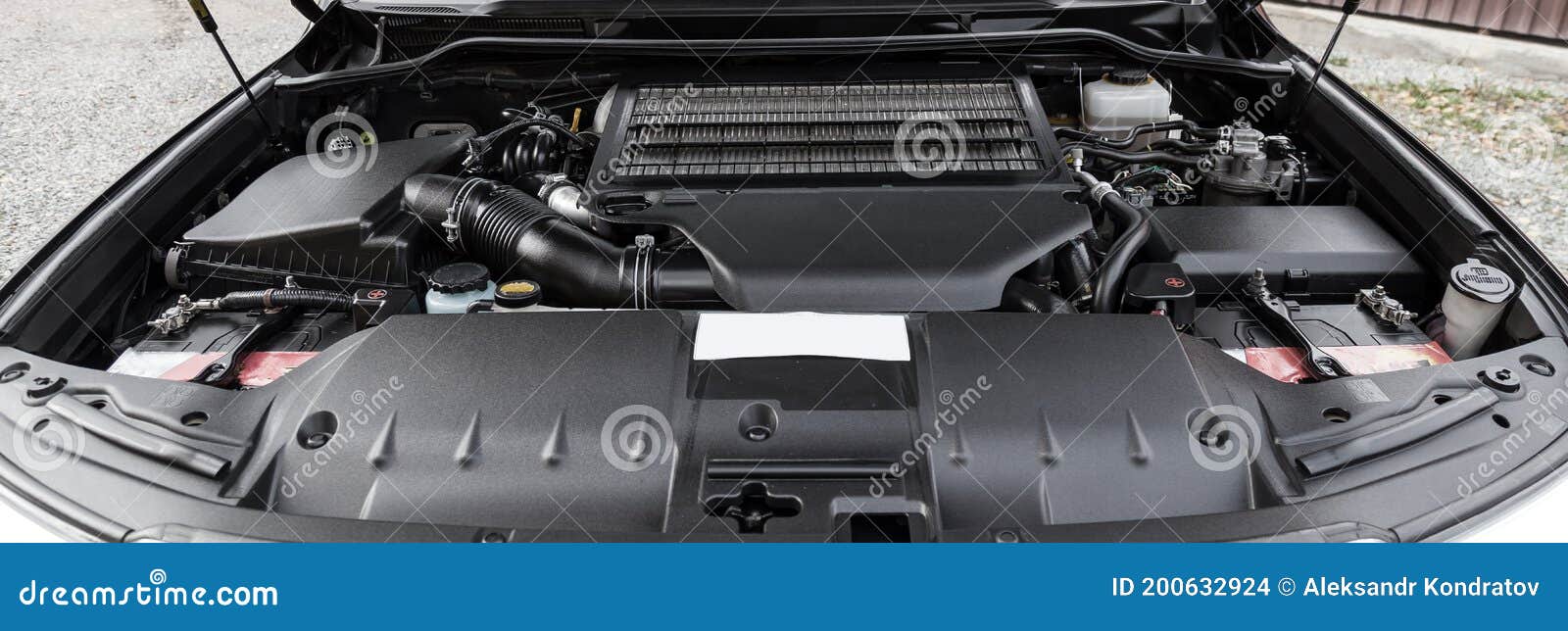 Front Engine Compartment of an Old Japanese Car with Clean Components and Assemblies Plastic