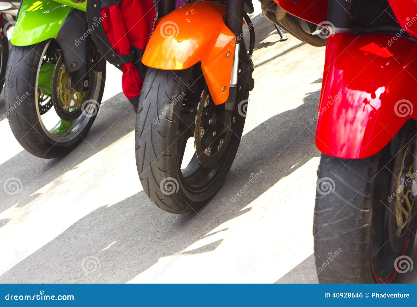 Front motorcycles wheels stock photo. Image of parked 40928646