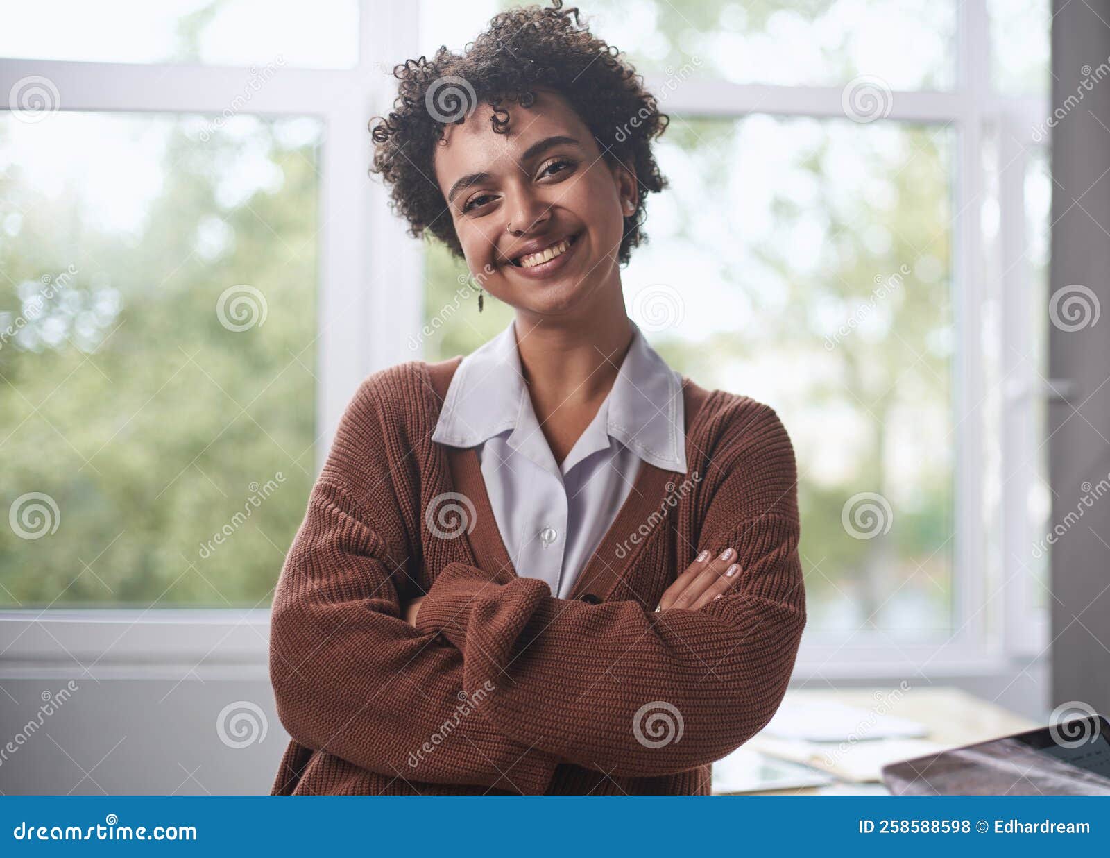 front portrait of pretty young woman in office