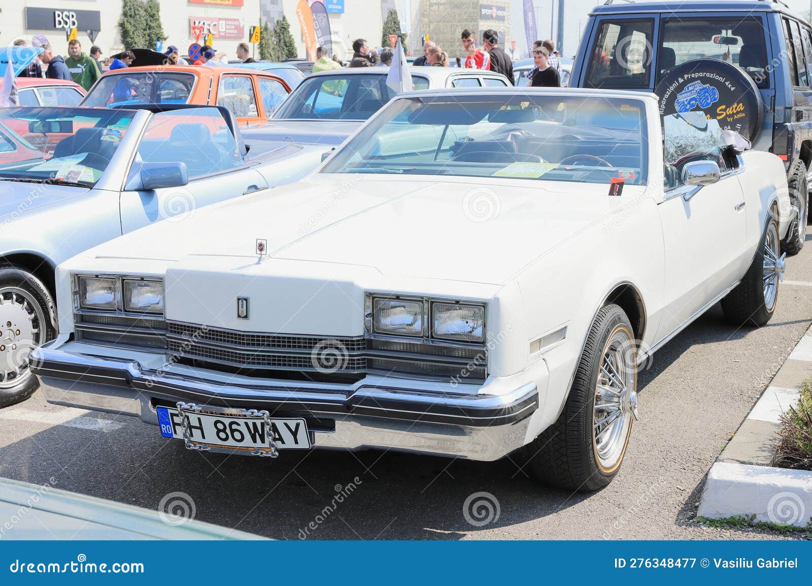 Front view 1984 Oldsmobile Toronado white car, parked in Retro & Electro Parade Ploiesti