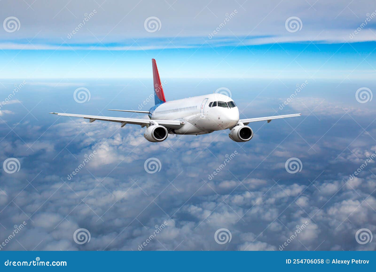 Front View of Aircraft in Flight. the Passenger Plane Flies High Above