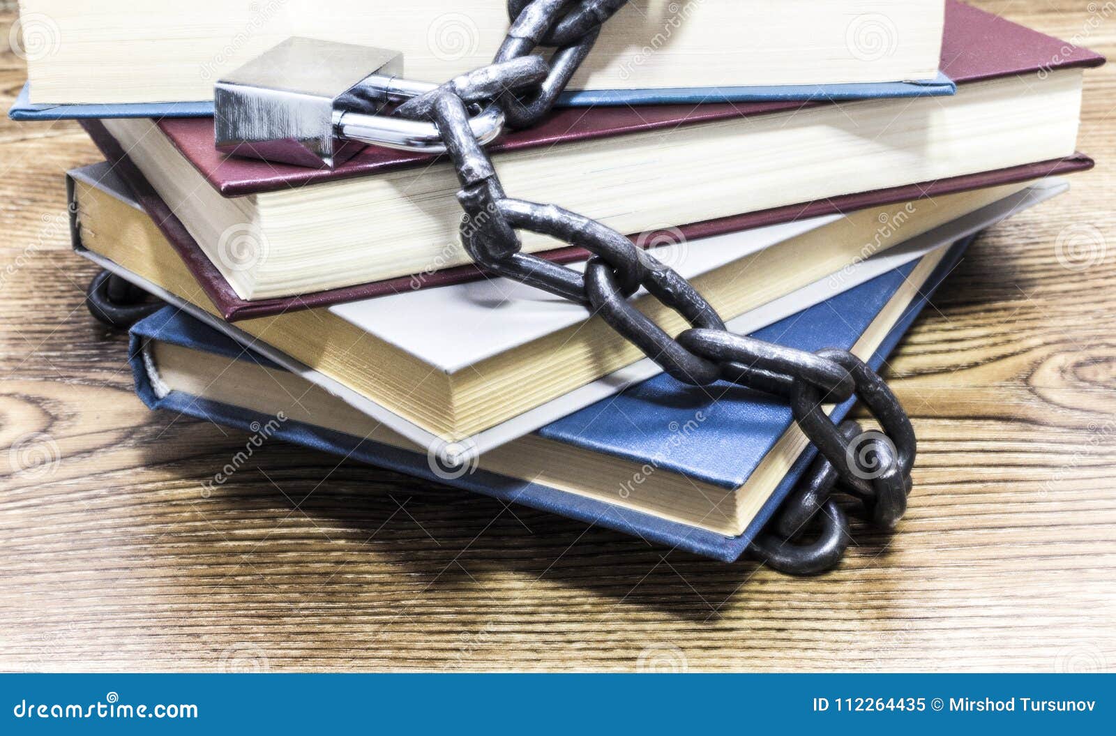 Front View of Books Locked with Padlock and Chains. Stock Image Image