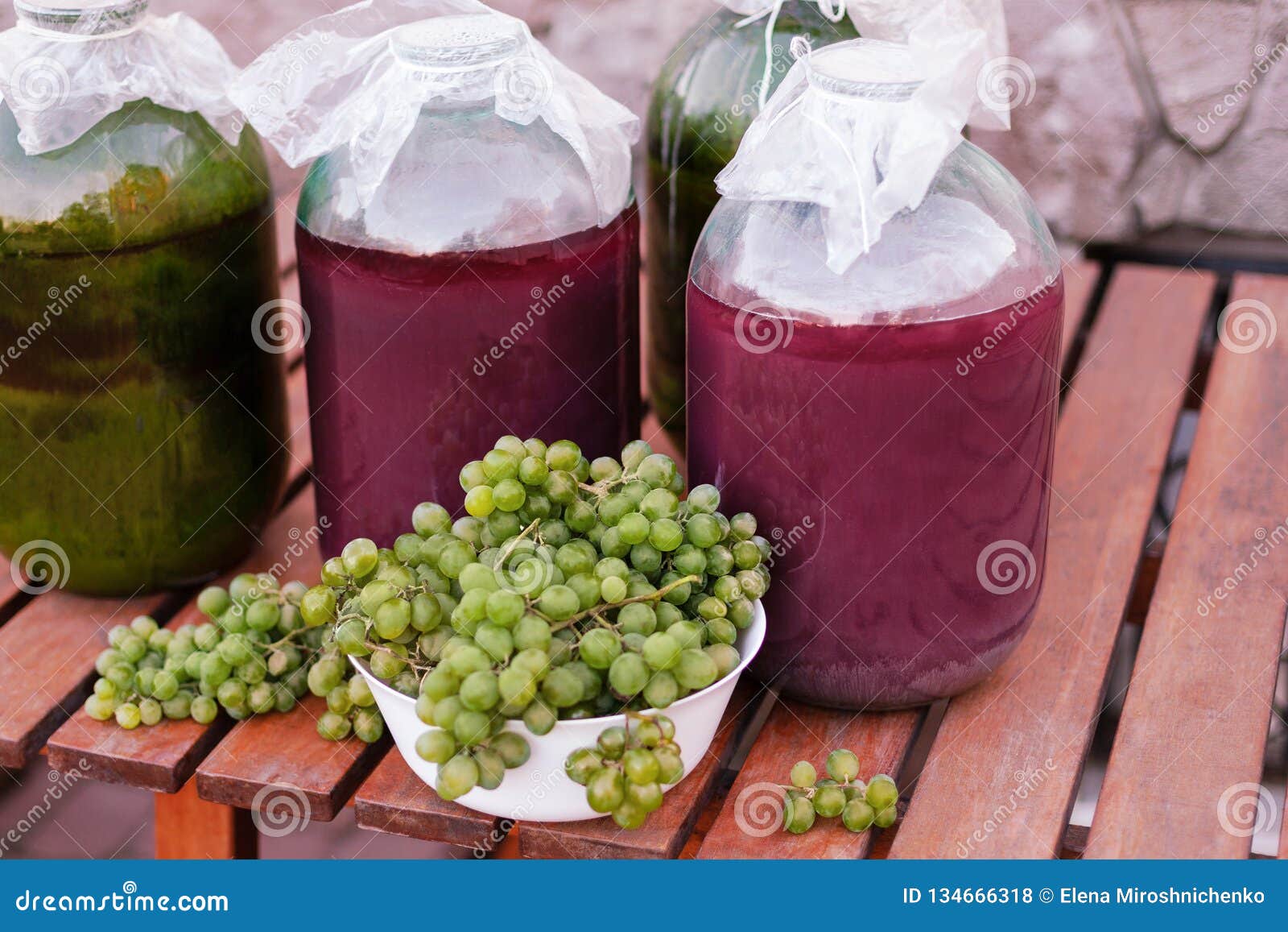 front view of bunches of yellow-green ripe grapes from an organic garden.