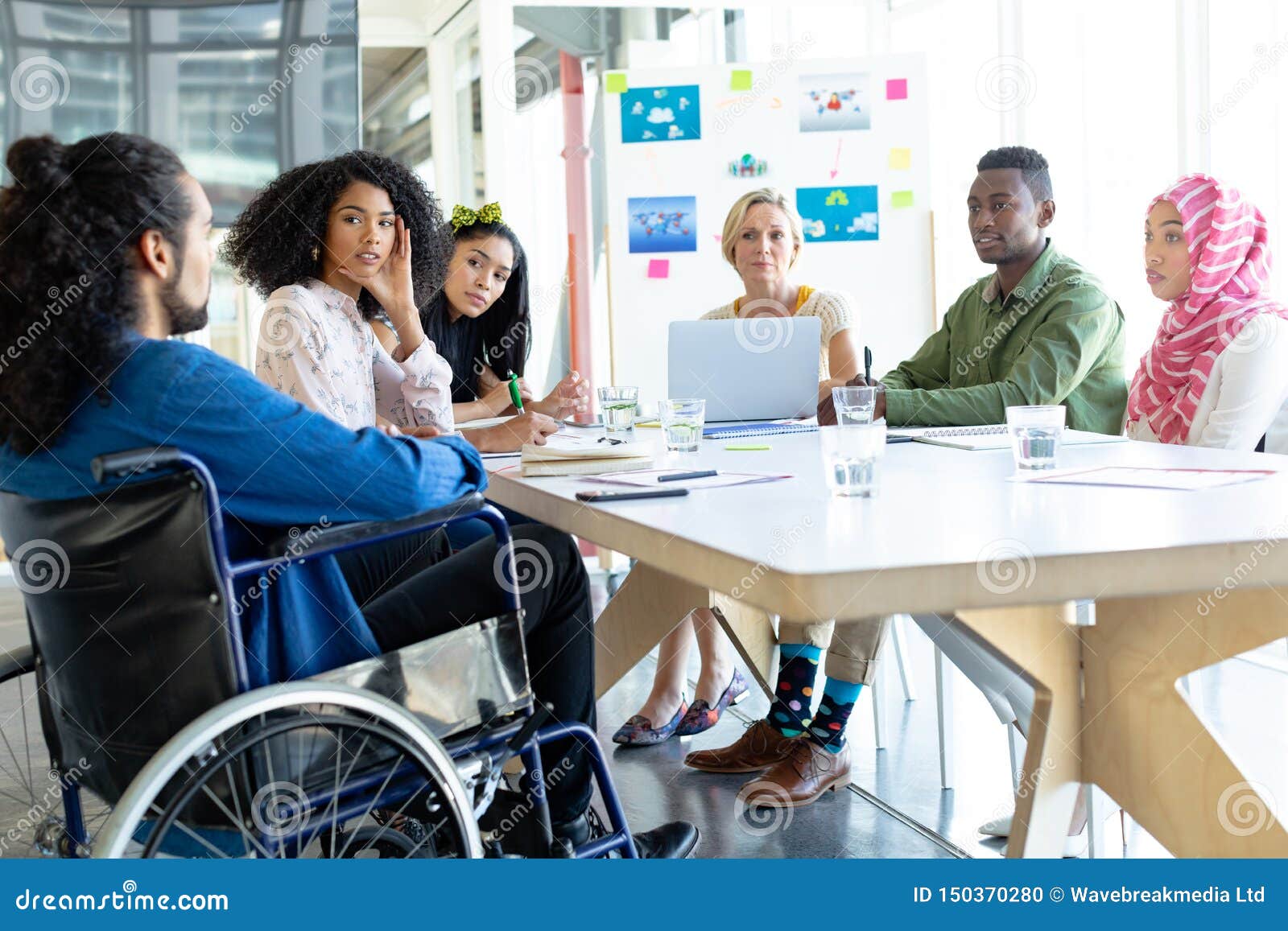 business people discussing with each other in meeting at conference room in a modern office