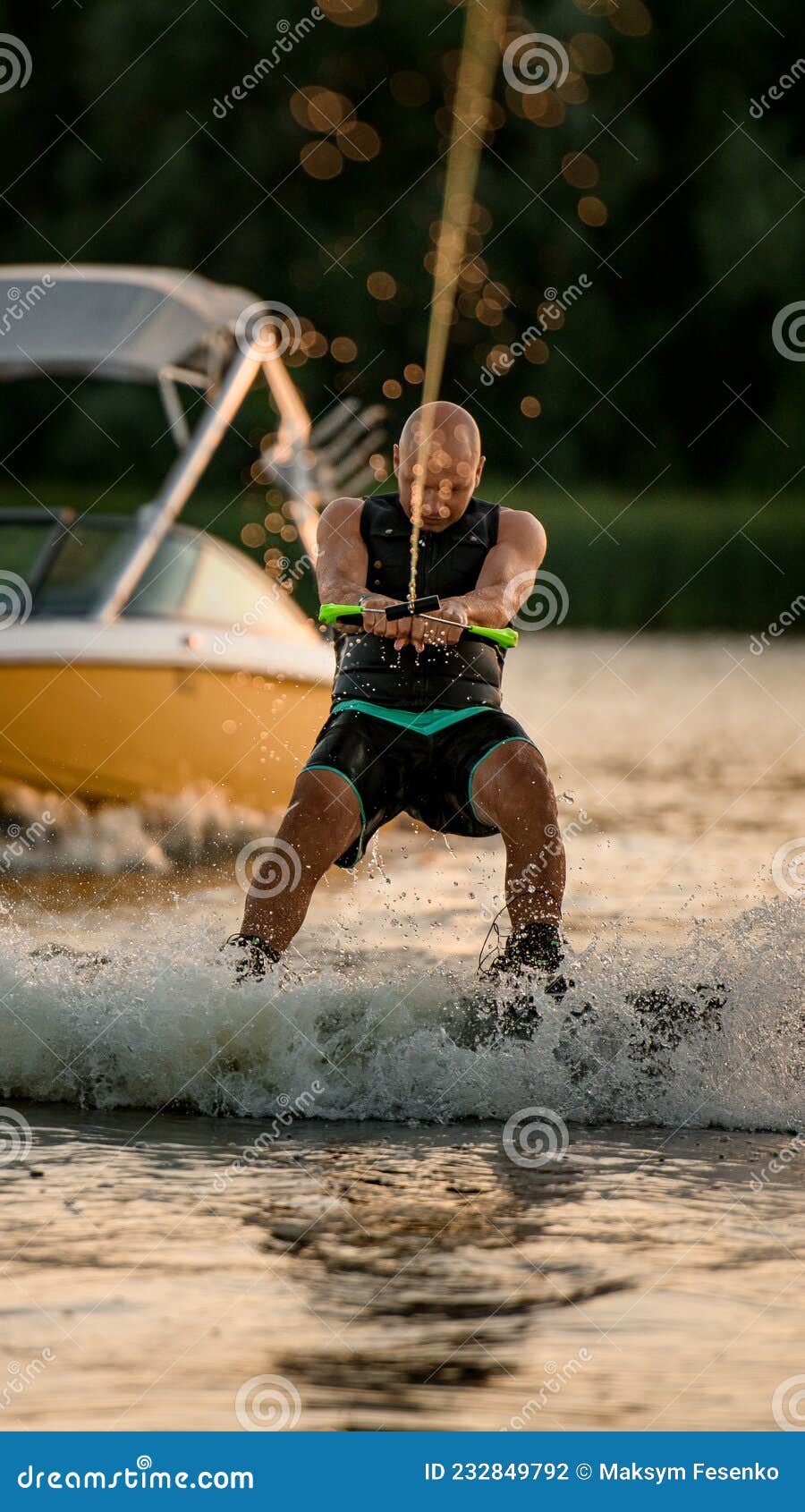Front View of Energetic Man Holding a Rope and Wakeboarding on the Water  Stock Photo - Image of activity, person: 232849792