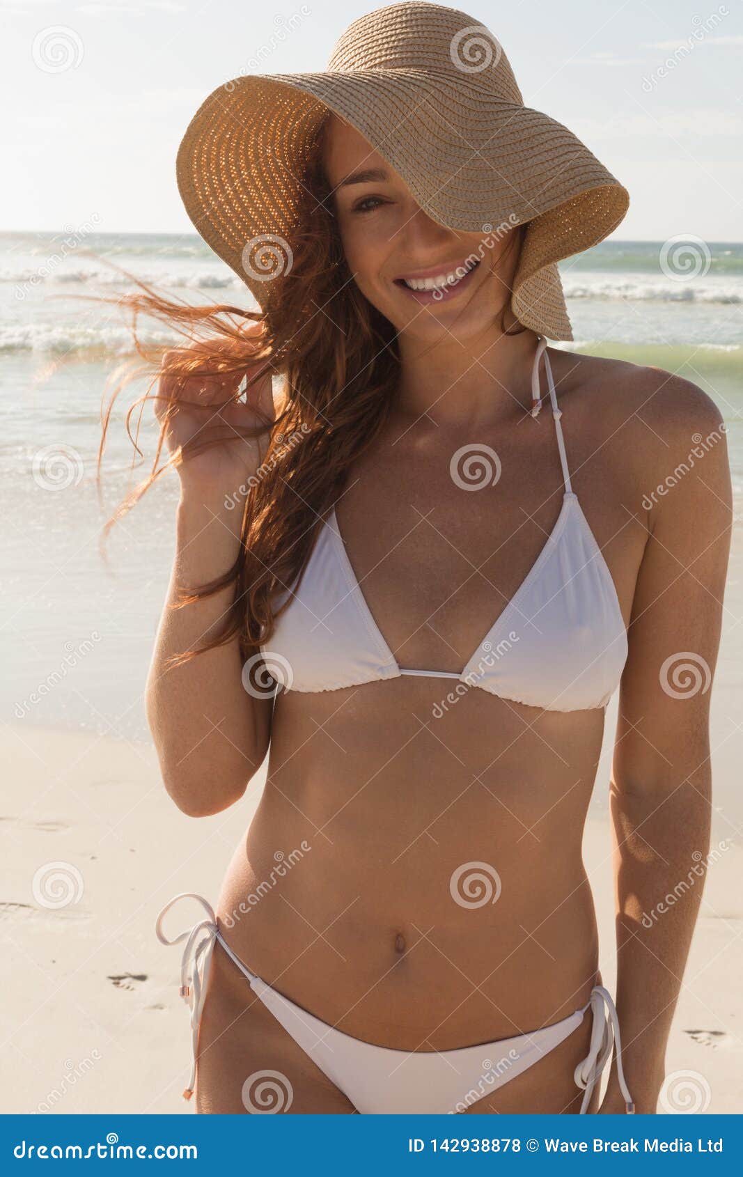 Young Caucasian Woman In Hat And Bikini Looking At Camera Stock Ph