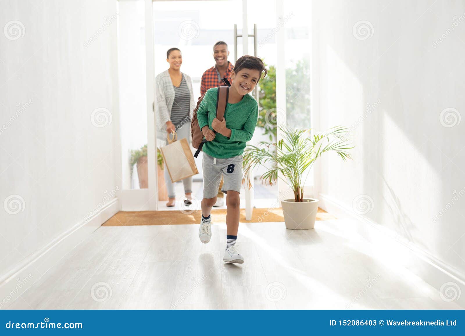 family entering their house