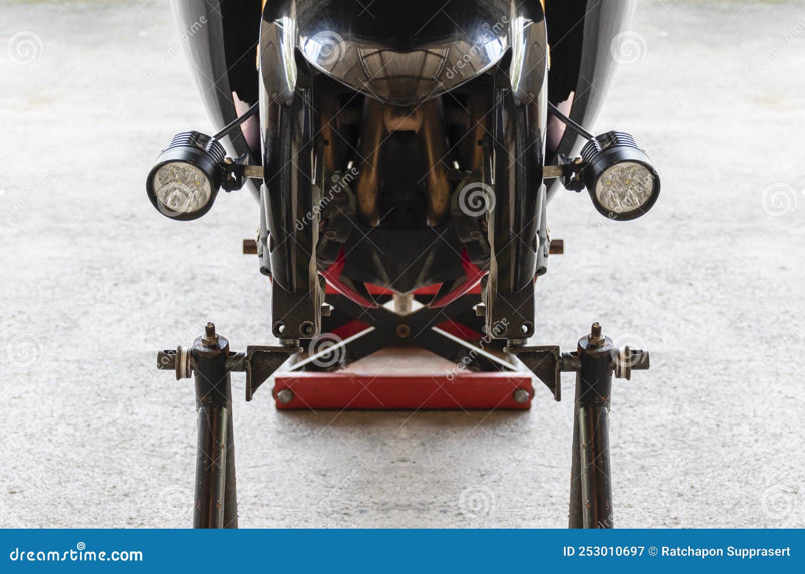 Front View Motorcycle Up To Stand To Remove Wheel To Change Tire Stock