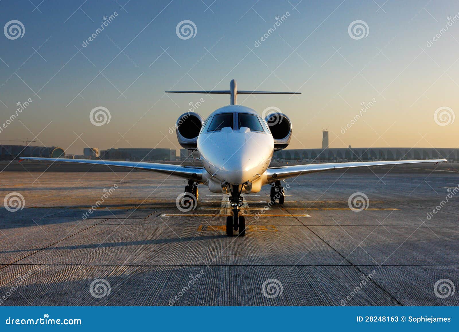 a front on view of a private jet