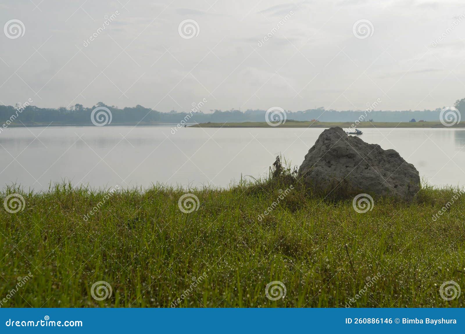 front view of reservoir karangkates malang indonesia between mountains