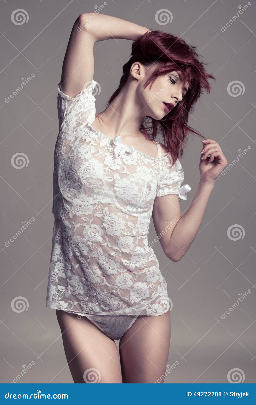 Front View of Sensual Woman in Shirt and Panties Stock Photo