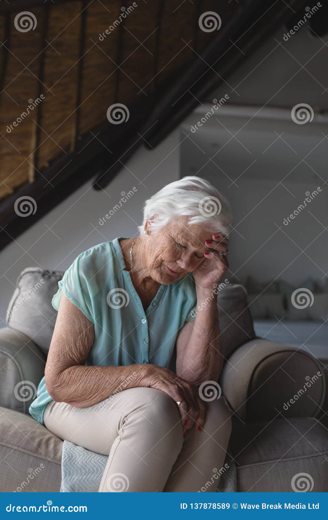 Worried Senior Woman Sitting In Living Room Stock Image Image Of