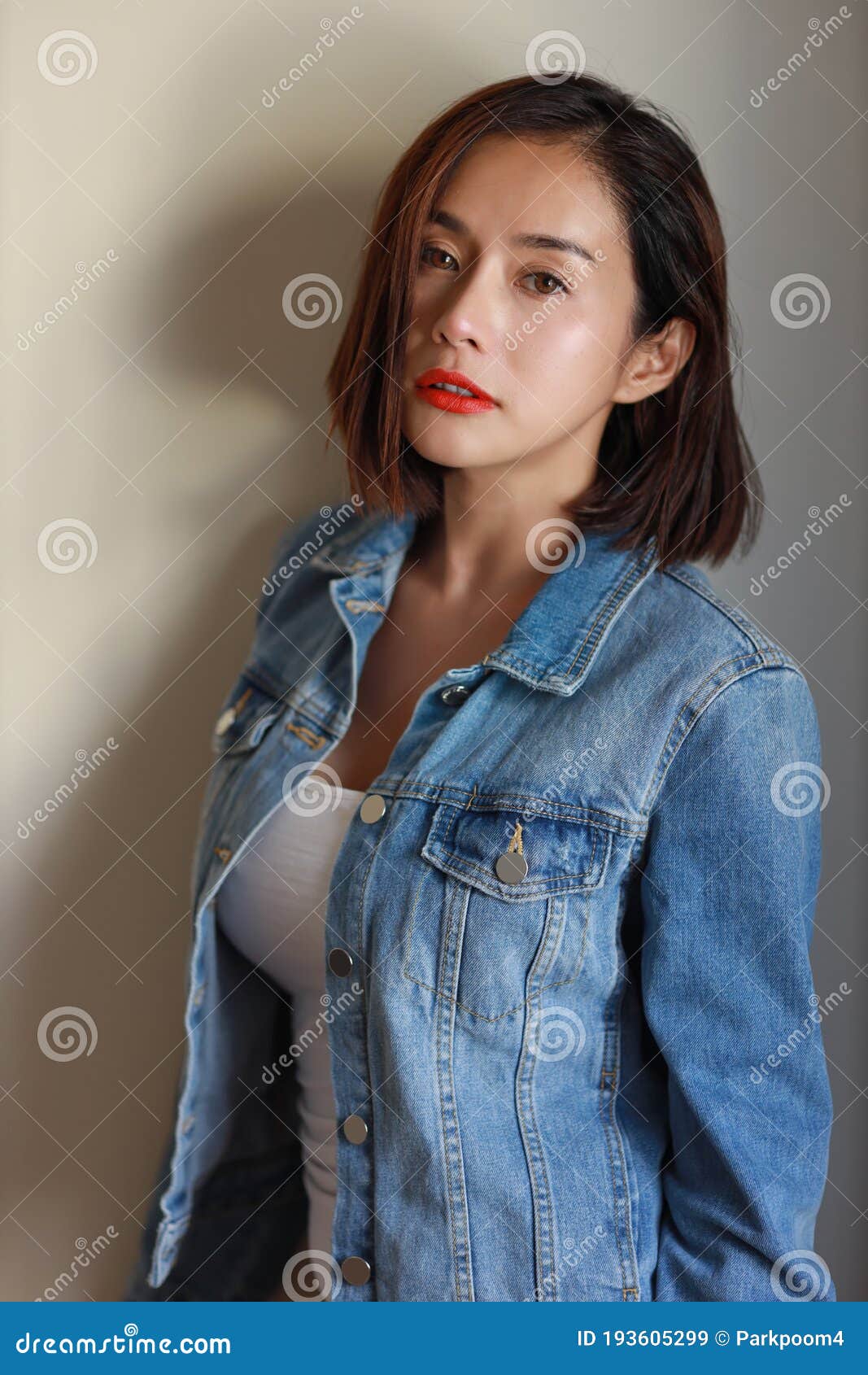 Front View Young Adult Asian Woman, Red Lip and Short Hair in Blue Jean  with Beauty Face Standing and Looking at Camera Stock Image - Image of  healthy, female: 193605299