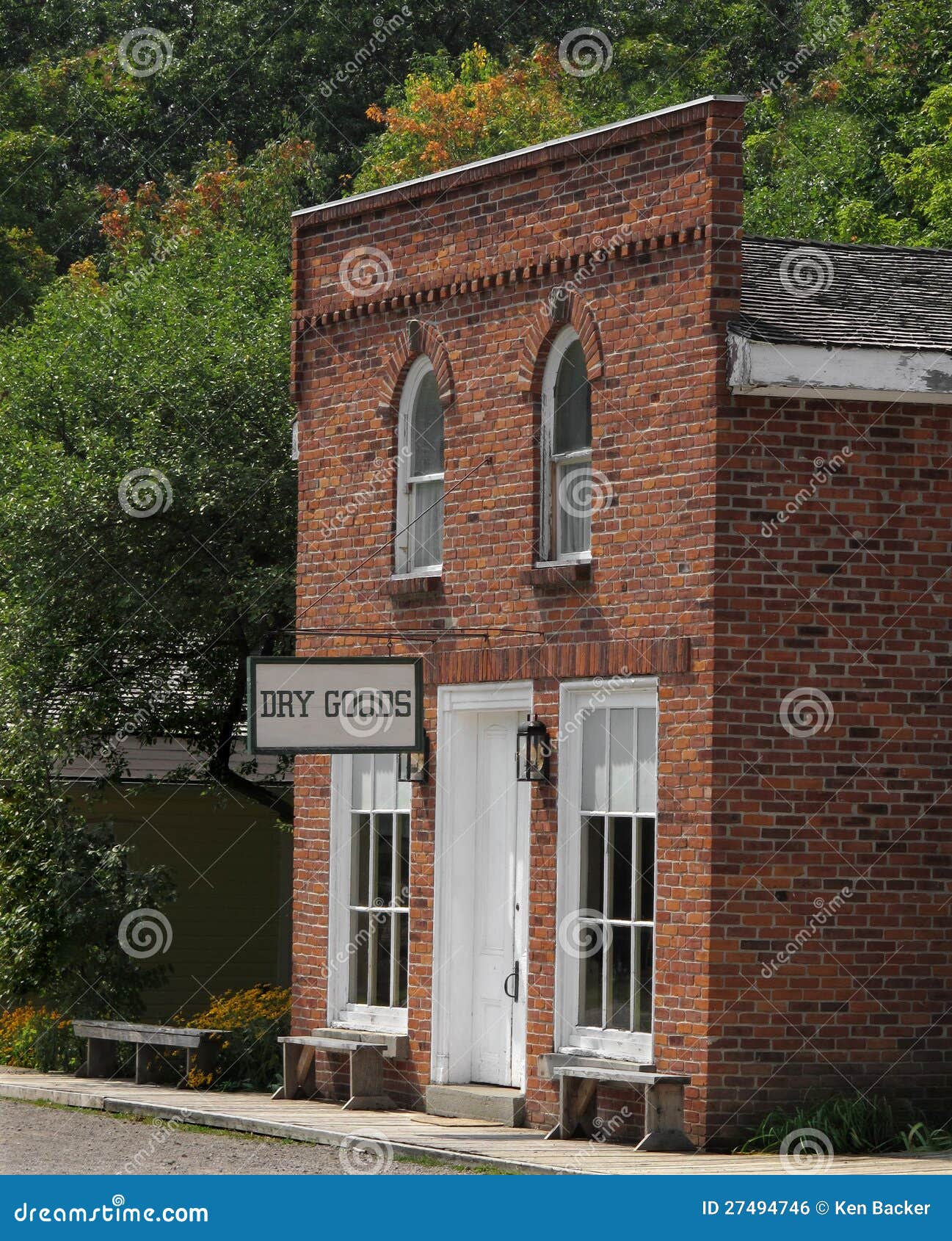 front of a vintage american dry goods store.