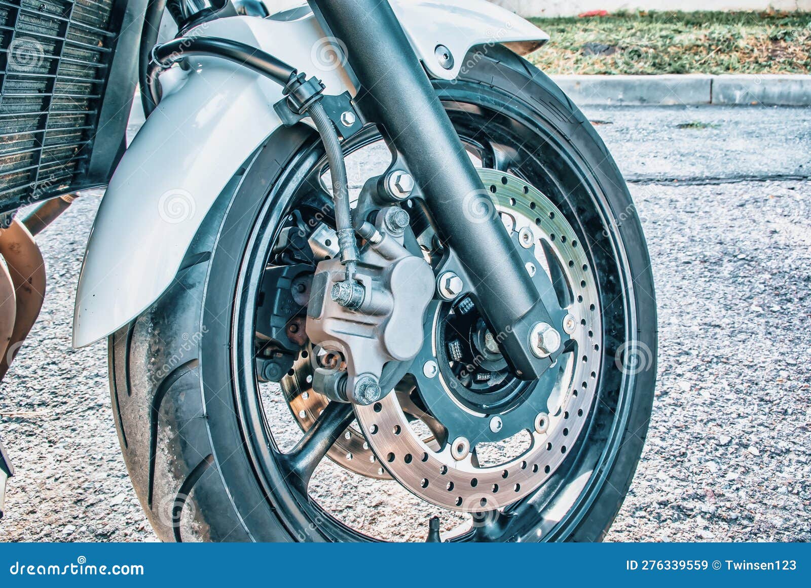 The Front Wheel of a Racing Motorcycle on the Road Stock Image Image