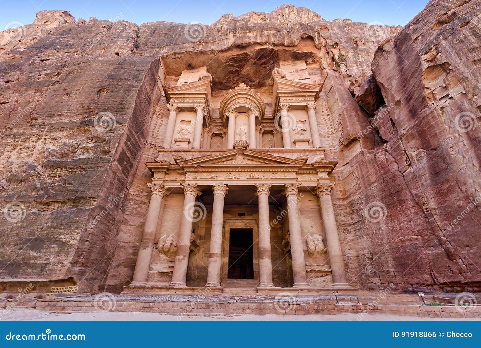 frontal view of `the treasury`, one of the most elaborate temples in the ancient arab nabatean kingdom city of petra, jordan