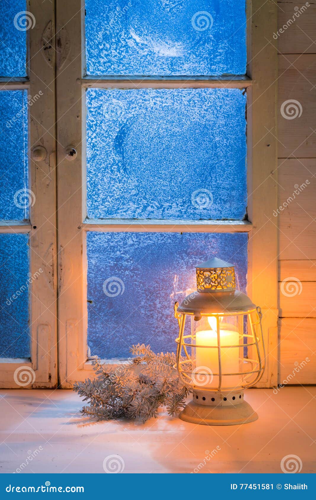 Frosted Blue Window with Candle for Christmas Stock Image - Image of