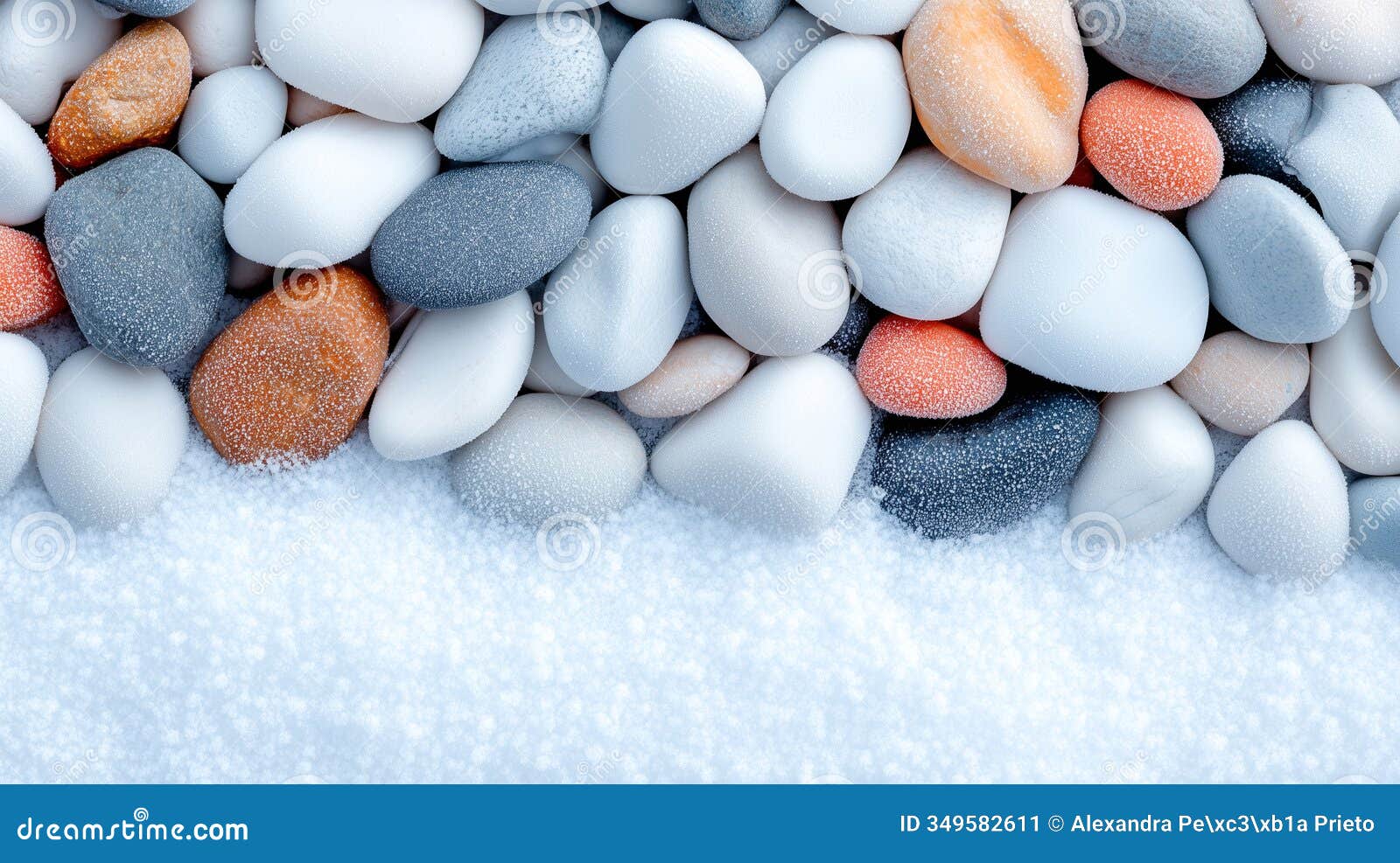 frosted multicolored stones in snow