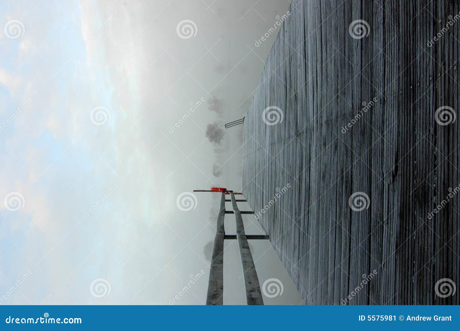 frosty pier on a lake