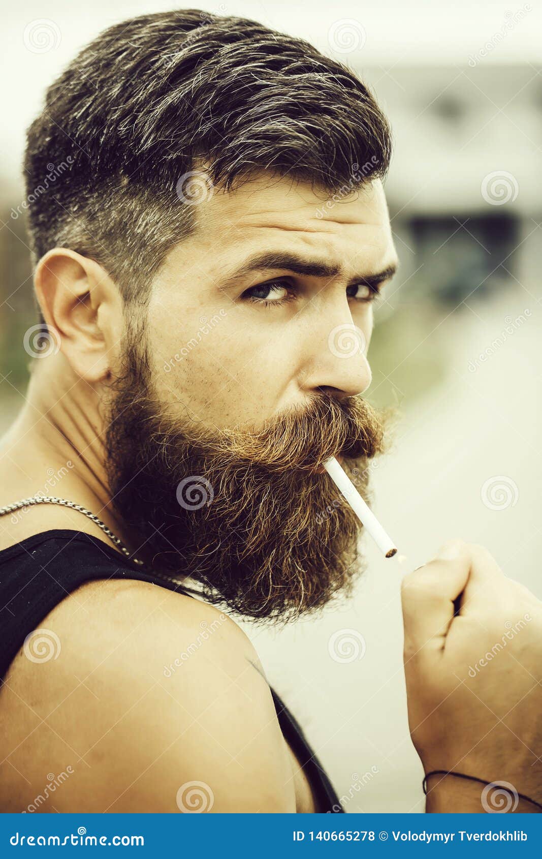 Frown Bearded Man Smoking Cigarette Stock Photo - Image of frown, adult:  140665278