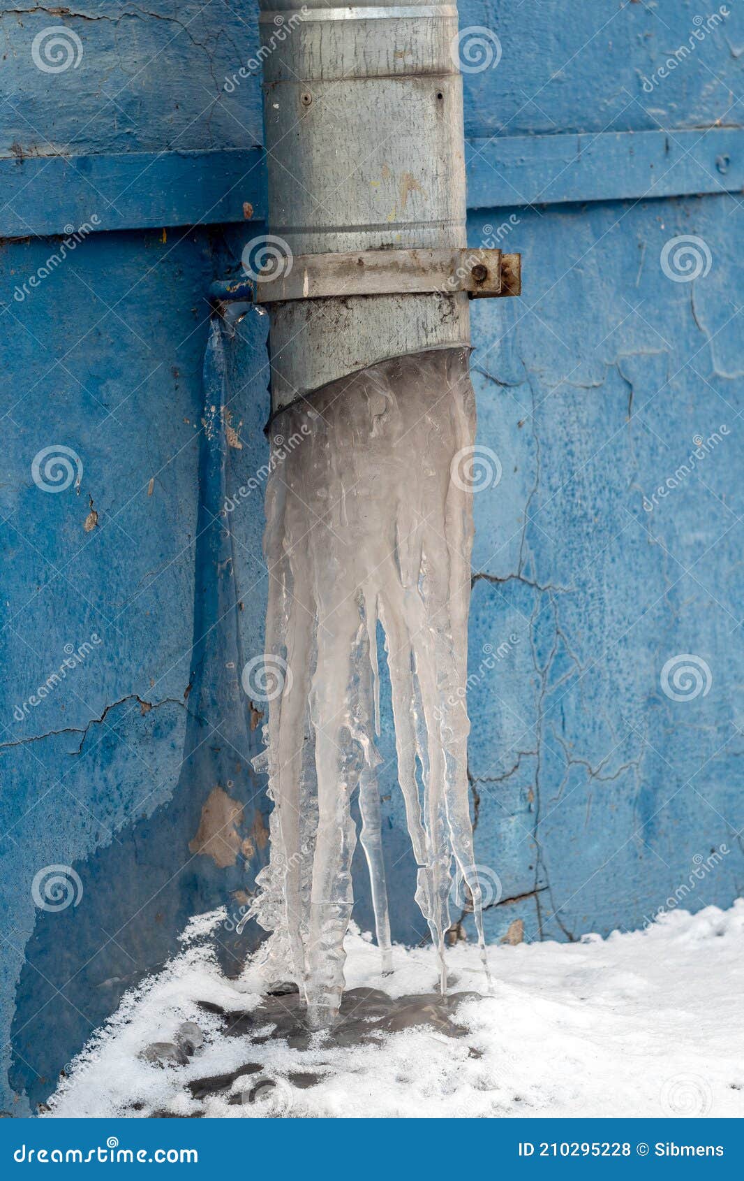 Frozen Downpipe. Icicles from the Downspout Stock Photo Image of