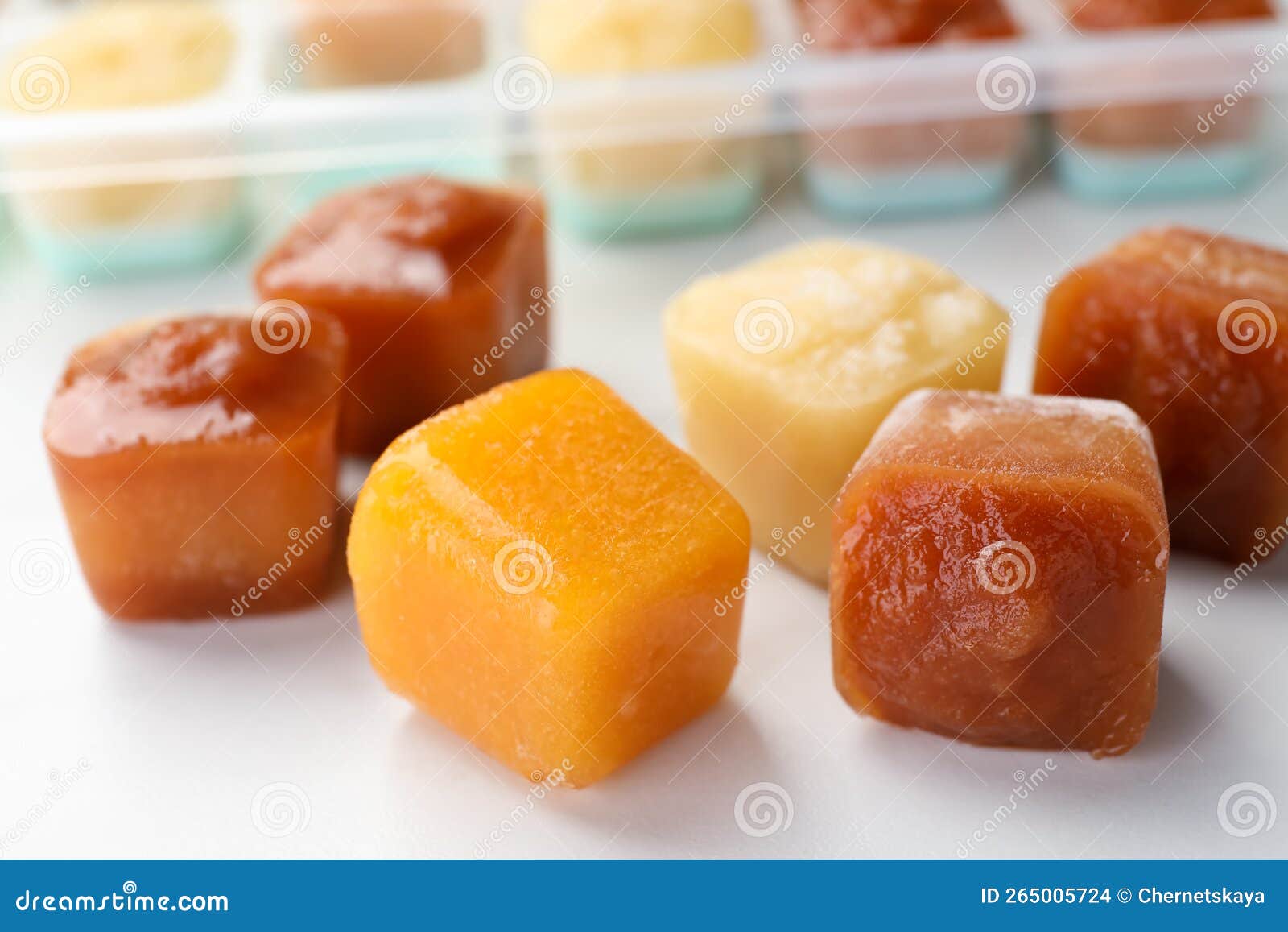 Frozen Fruit Puree Cubes on Table, Closeup Stock Photo Image of child