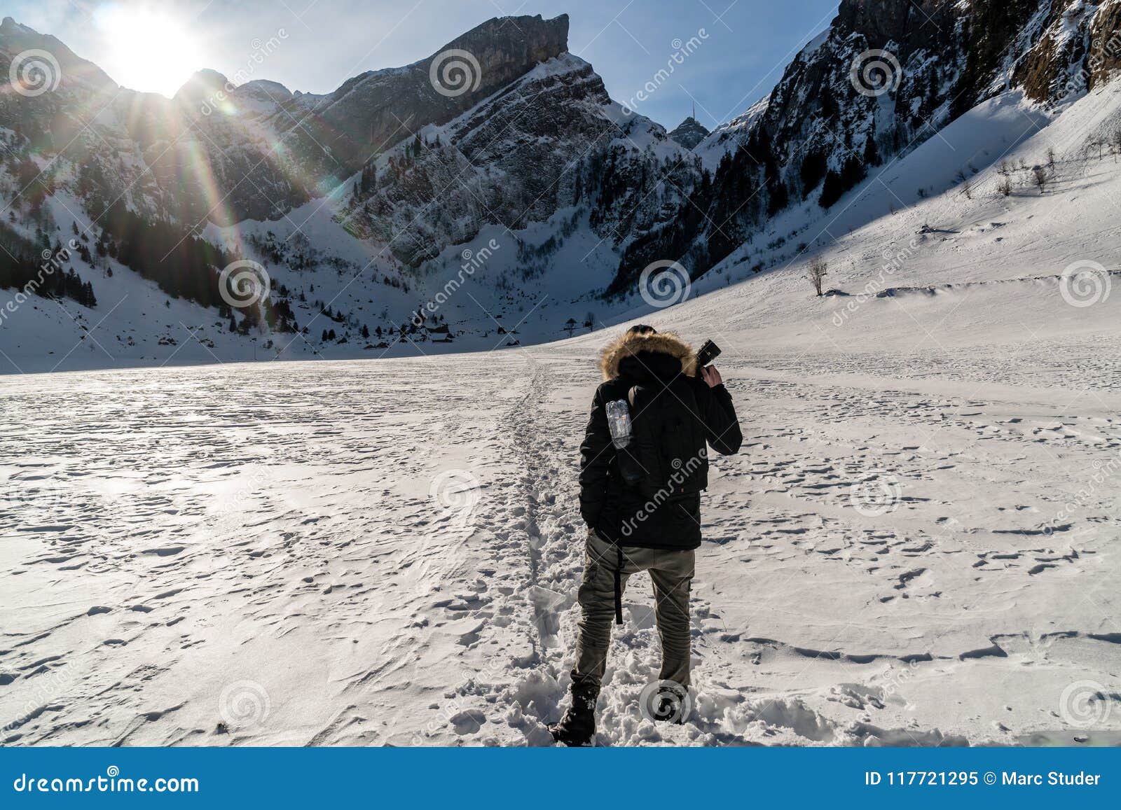 Hiking Over Frozen Lake With Small Village Swiss Mountains Editorial