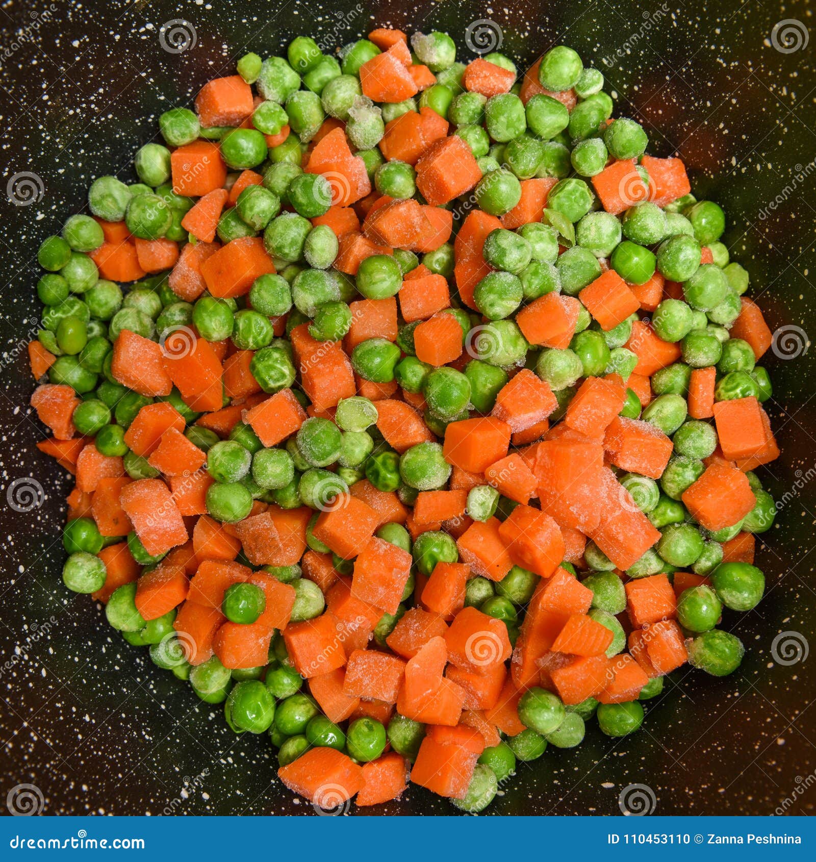 Frozen peas and carrots stock photo. Image of crystal 110453110