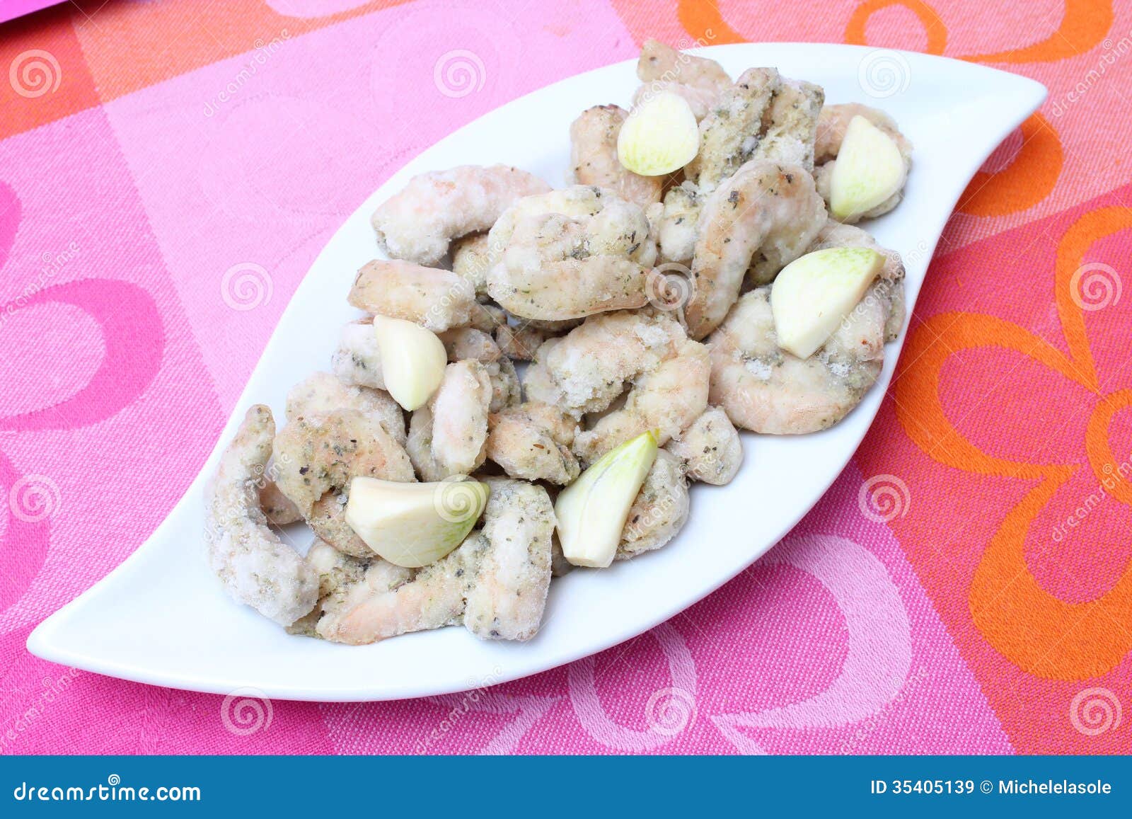Frozen prawns with garlic stock image. Image of dish 35405139