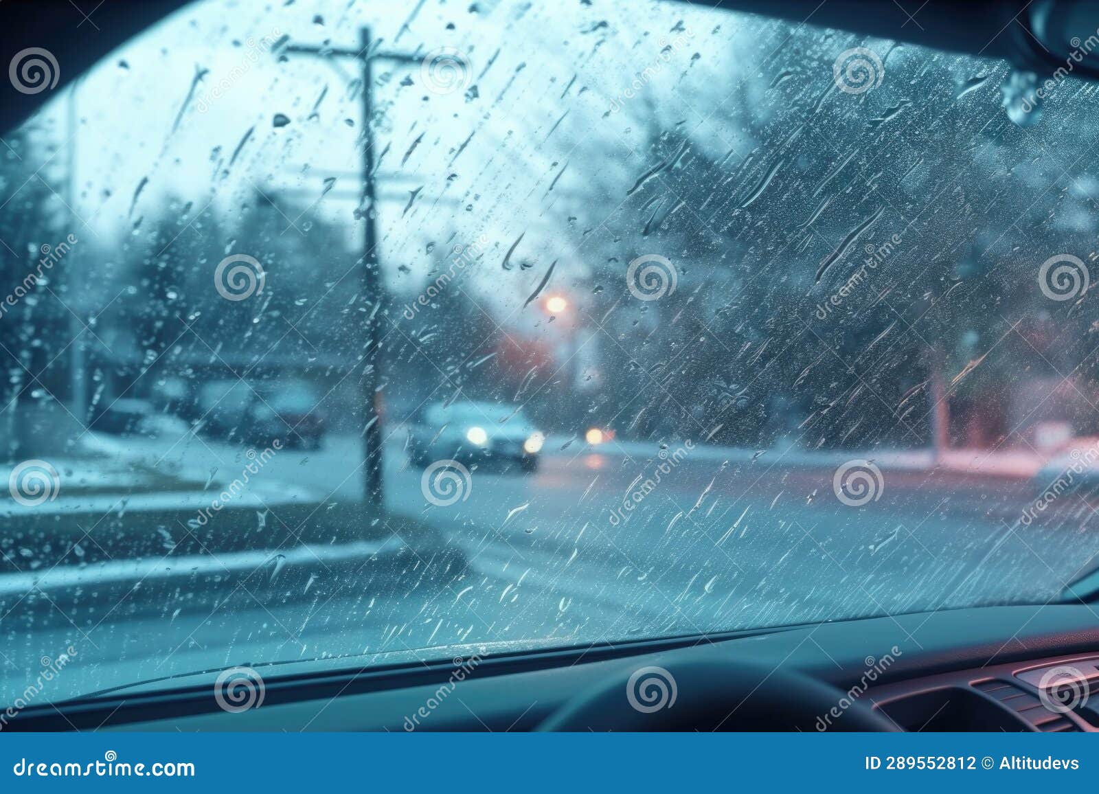 Frozen Rain Droplets Clinging To Car Windshield Wipers Stock Photo