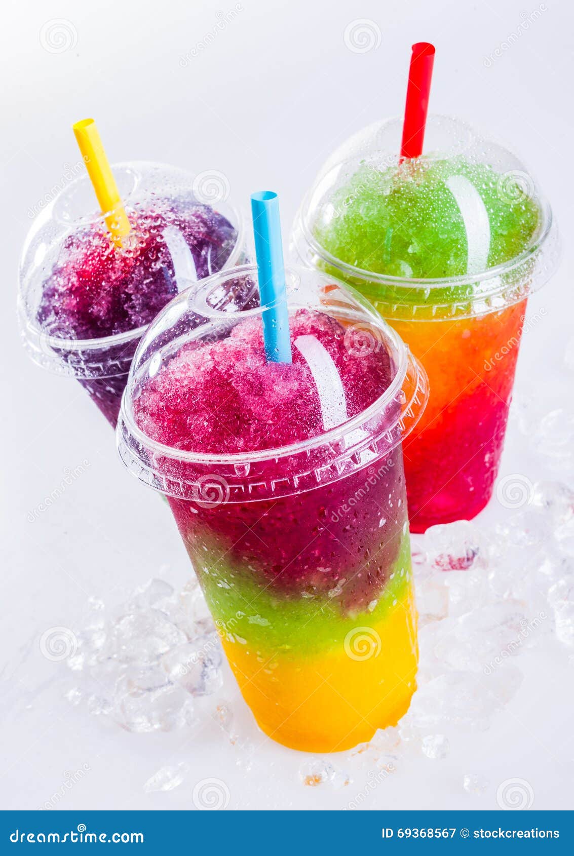 Frozen Rainbow Slush Drinks Chilling on Ice Stock Image - Image of ...