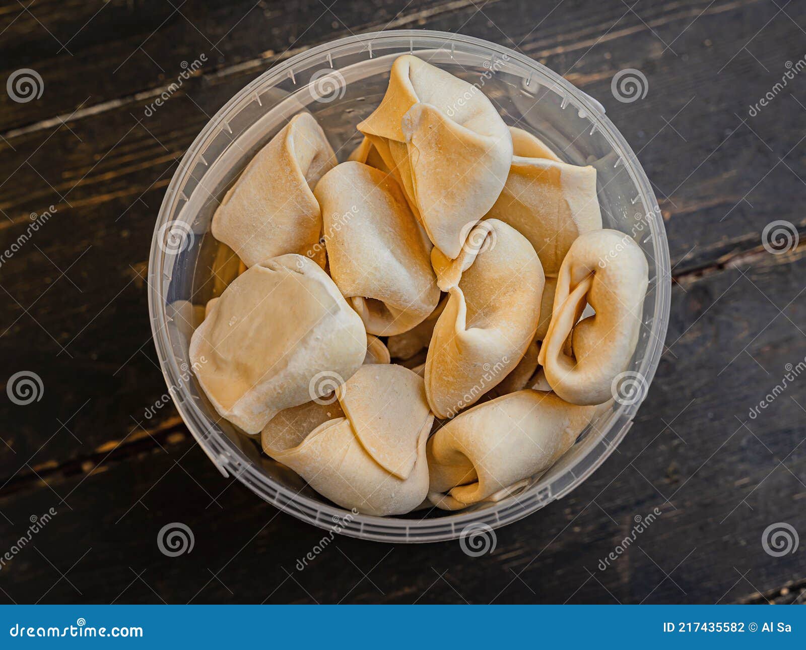 Frozen Russian Crude Pelmen or Dumplings. Close Up. Stock Photo Image