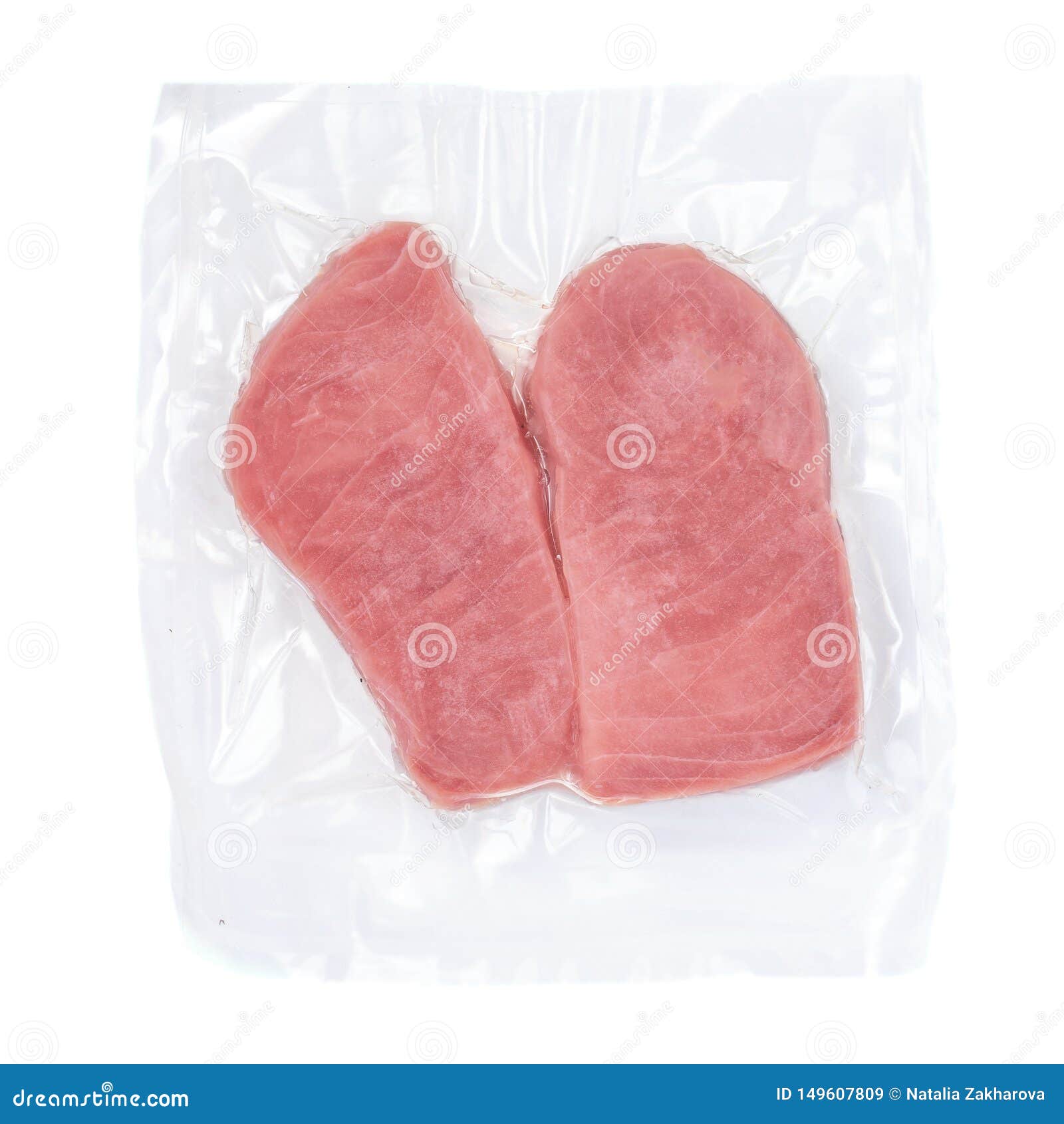 Frozen Tuna Fish Steak in a Vacuum Plastic Package Isolated on White