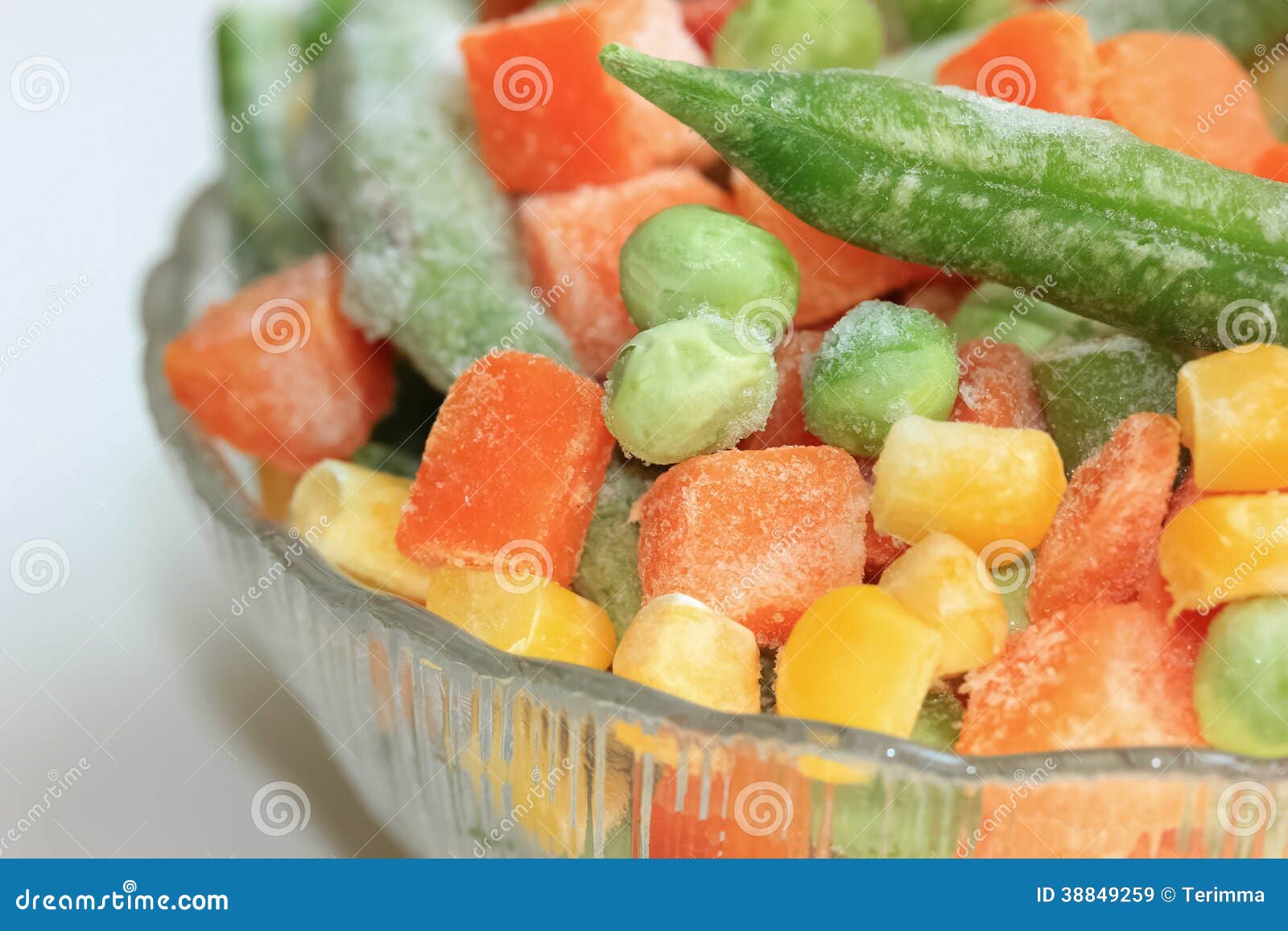 Frozen vegetables in bowl stock image. Image of green 38849259