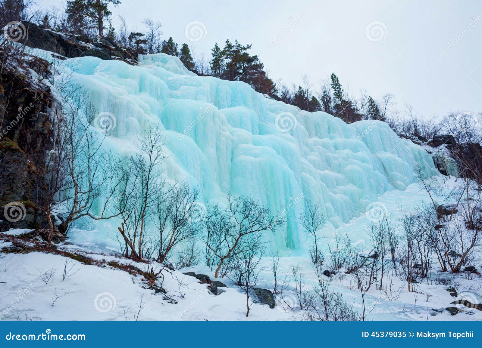 Frozen waterfall in Norway stock image. Image of alpine 45379035