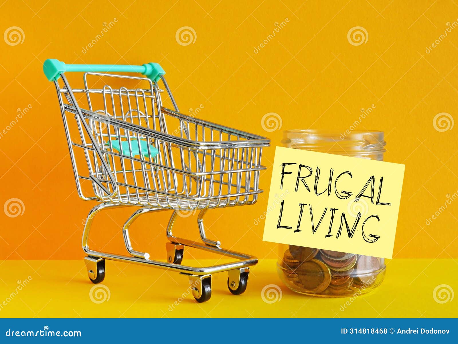 Frugal Living and Frugality are Shown Using the Text Stock Photo