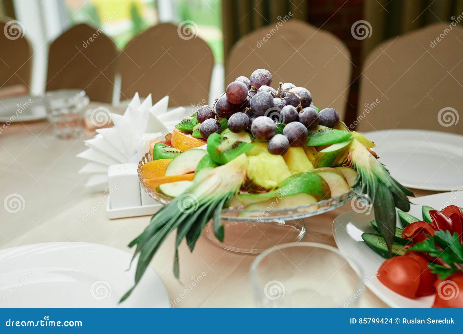 Fruit basket on the table stock photo. Image of dinner 85799424