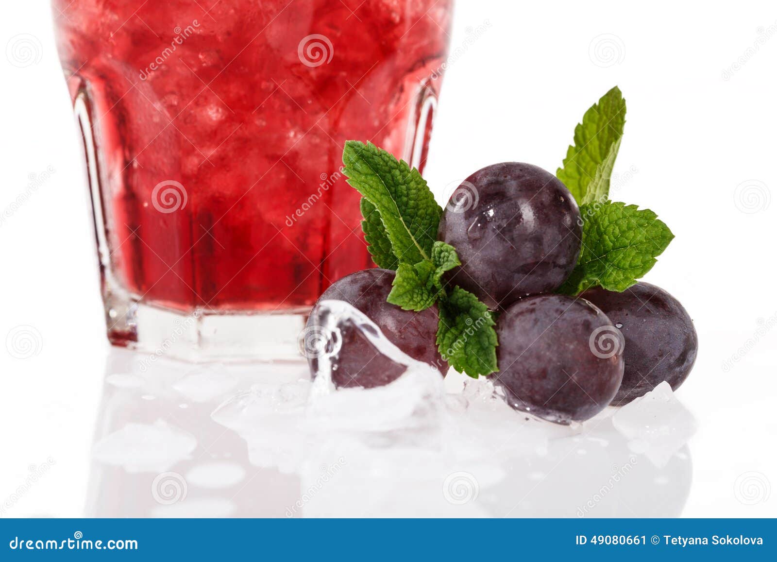 Fruit cocktail with grape stock image. Image of cube 49080661