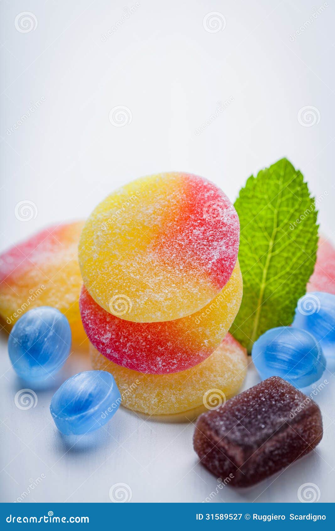 Fruit gums and mint leaf stock image. Image of dessert 31589527