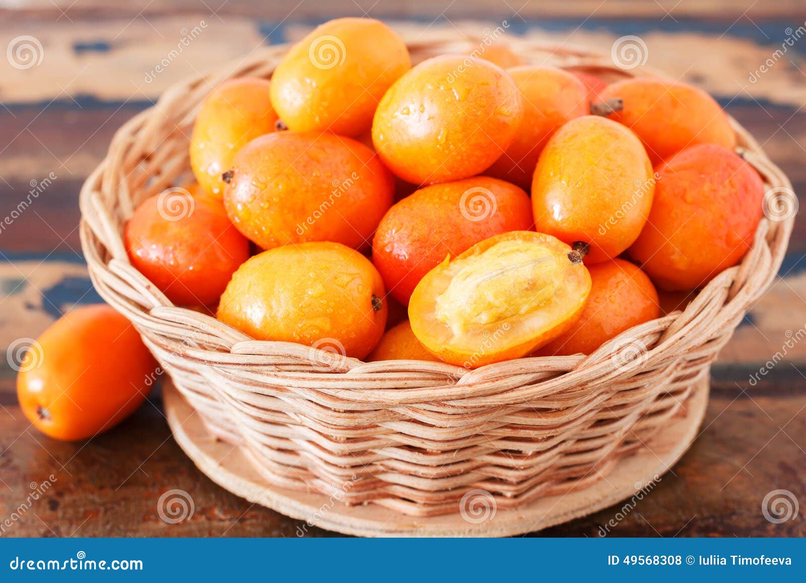 fruit jocote ( siriguela, red, purple mombin, sineguela, hog plum, ciruela huesito) in wicker basket