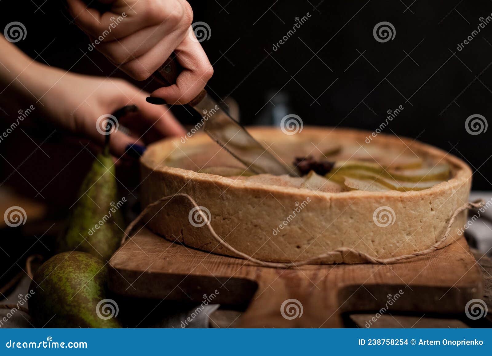 Fruit Pie Crust. Chef& X27;s Hand Cut with Knife Pie Crust Sliced on a Rustic Kitchen Table
