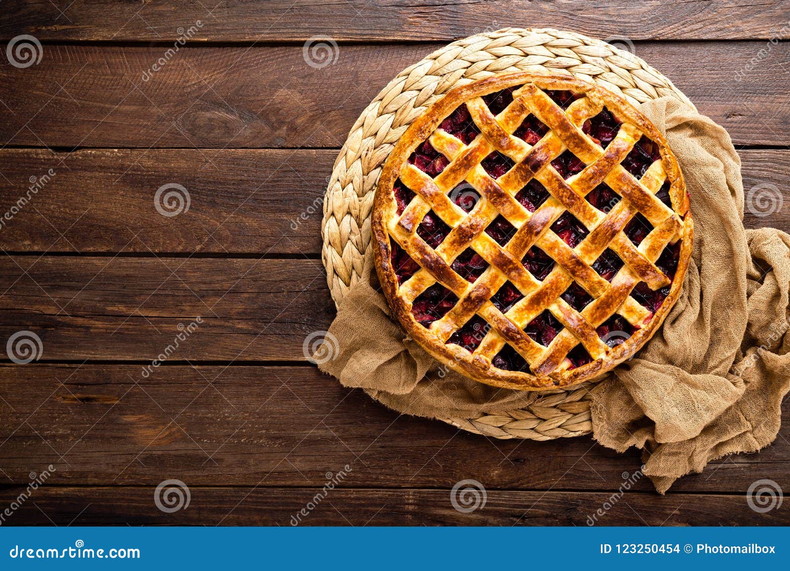 fruit pie. sweet pie, tart with fresh plums. delicious cake with plums