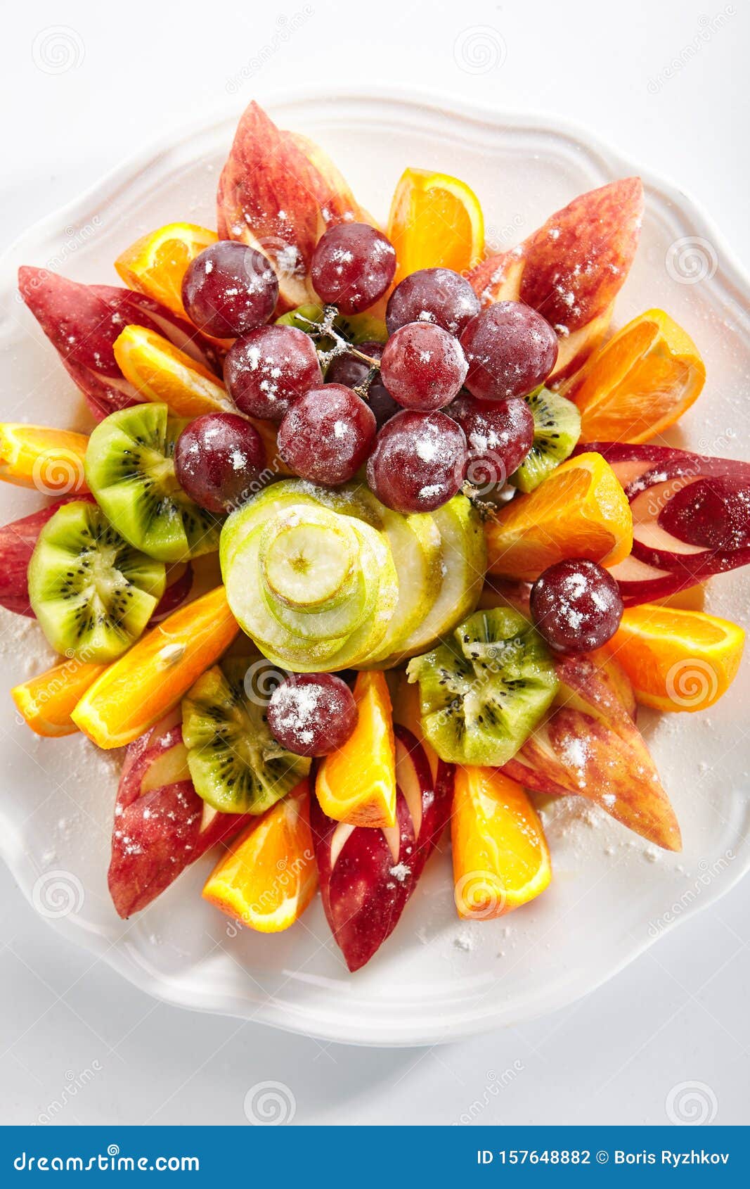 Fruit Plate with Orange Wedges, Apple, Grapes, Kiwi and Pear Stock