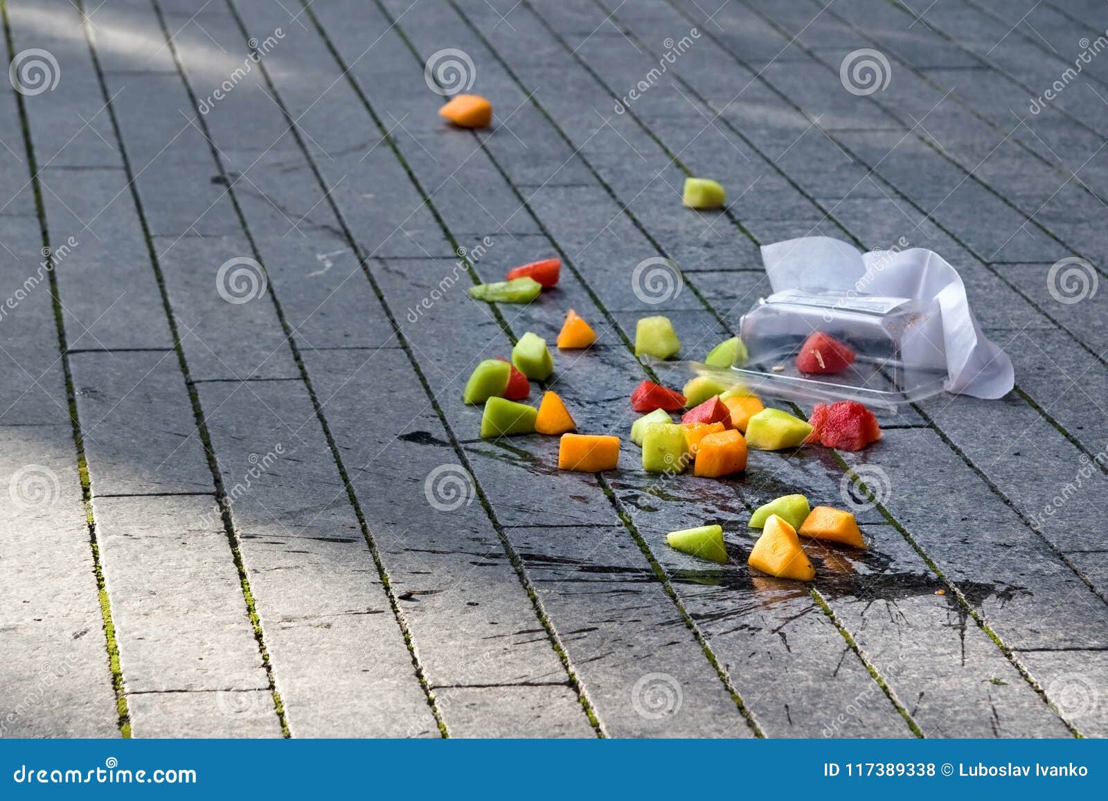 fruit salad accidentally dropped to ground. misfortune concept
