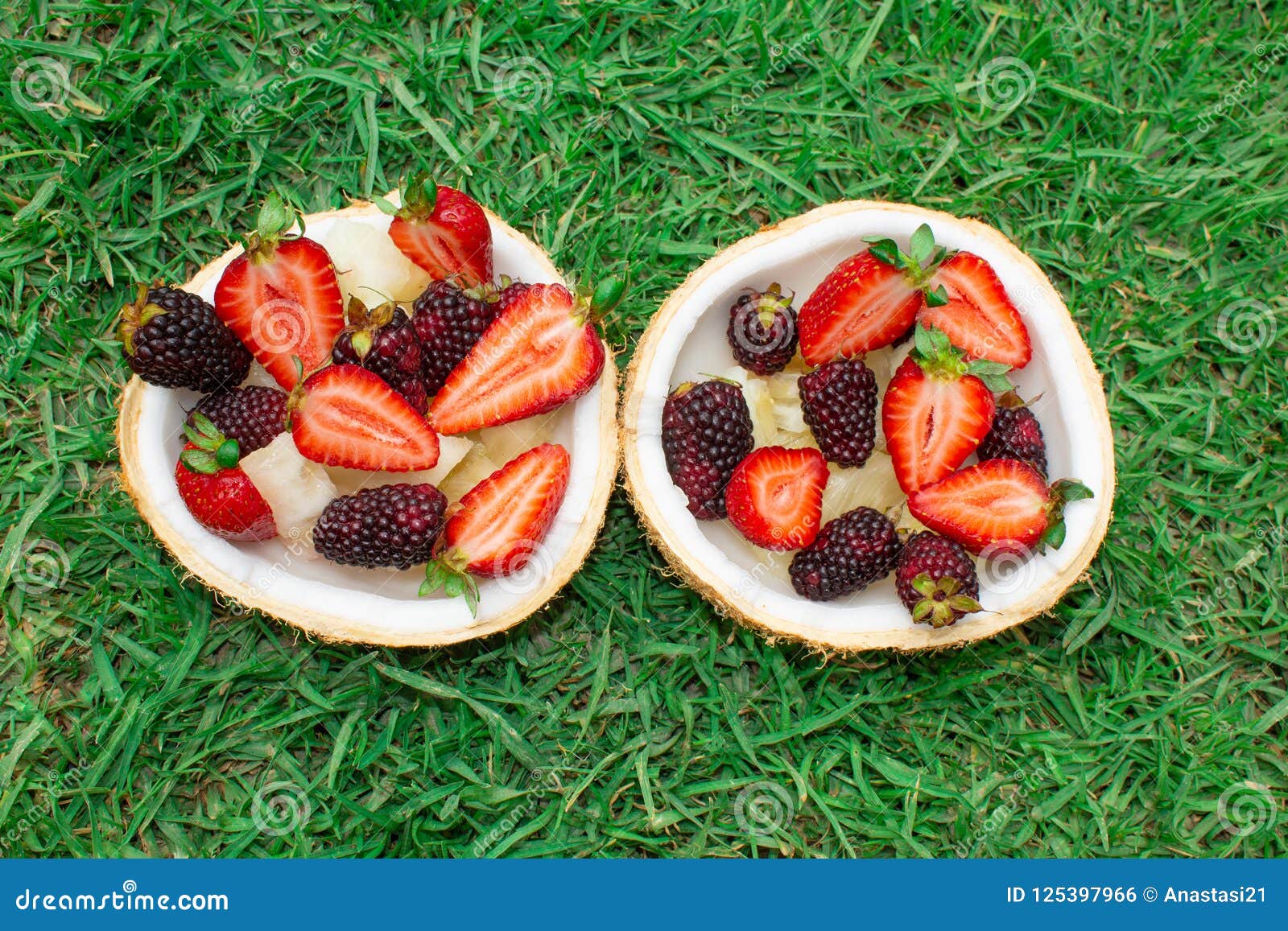 Fruits and Berries, Strawberries, Blackberries in Coconut. on the Green ...