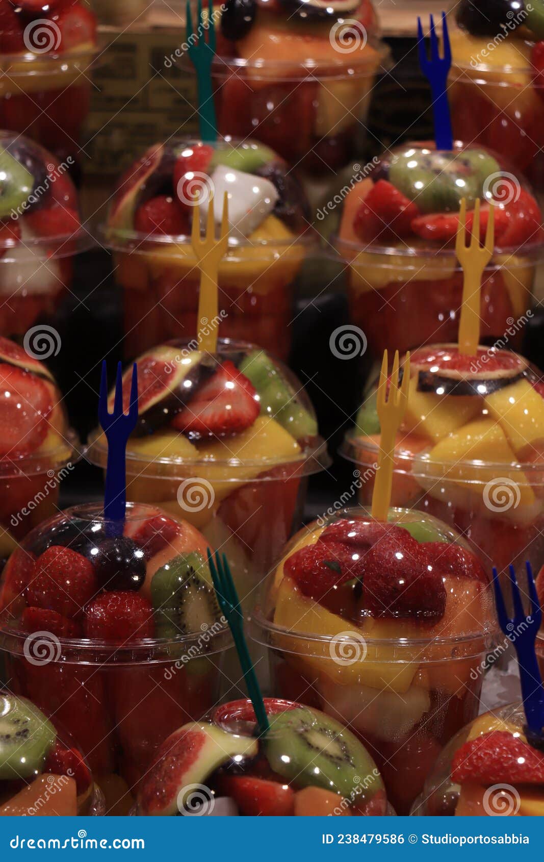Fruit salad in a container stock photo. Image of stall 238479586