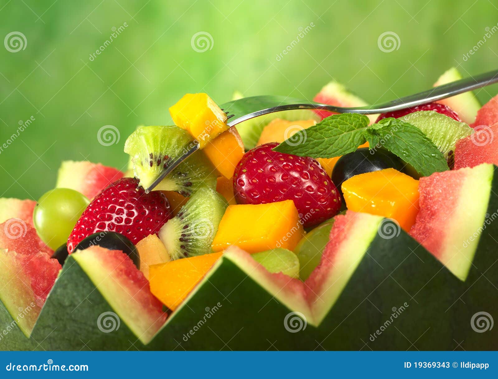 Fruit Salad in Melon Bowl stock image. Image of fresh 19369343