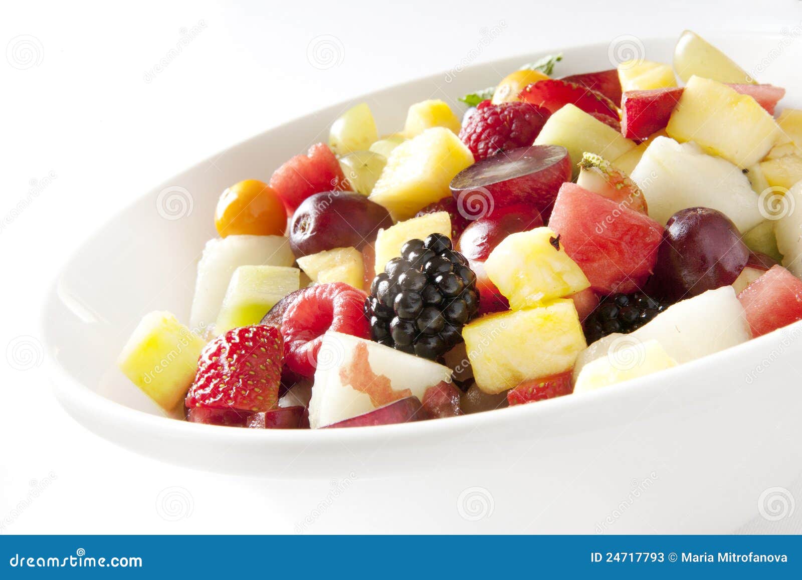 Fruit salad in white plate stock image. Image of grape 24717793