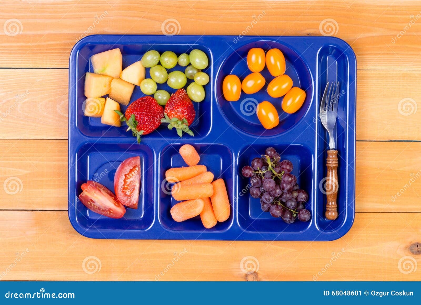 fruit sampler in lunch tray with fork